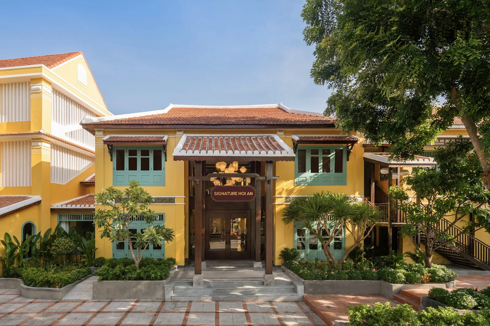The Signature Hoi An – A Luxury Hotel Next to the Night Market with a Waterfall Pool